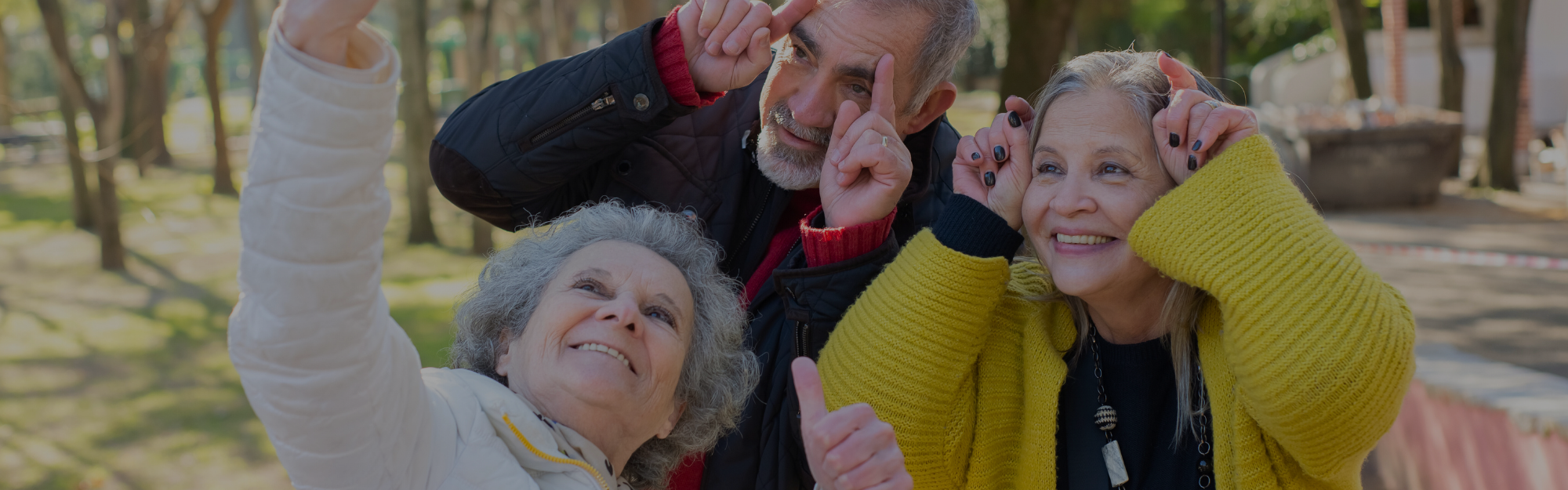 elderly people taking selfies on a tour