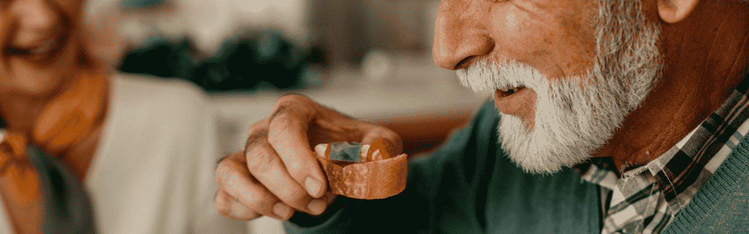 senior citizen eating food