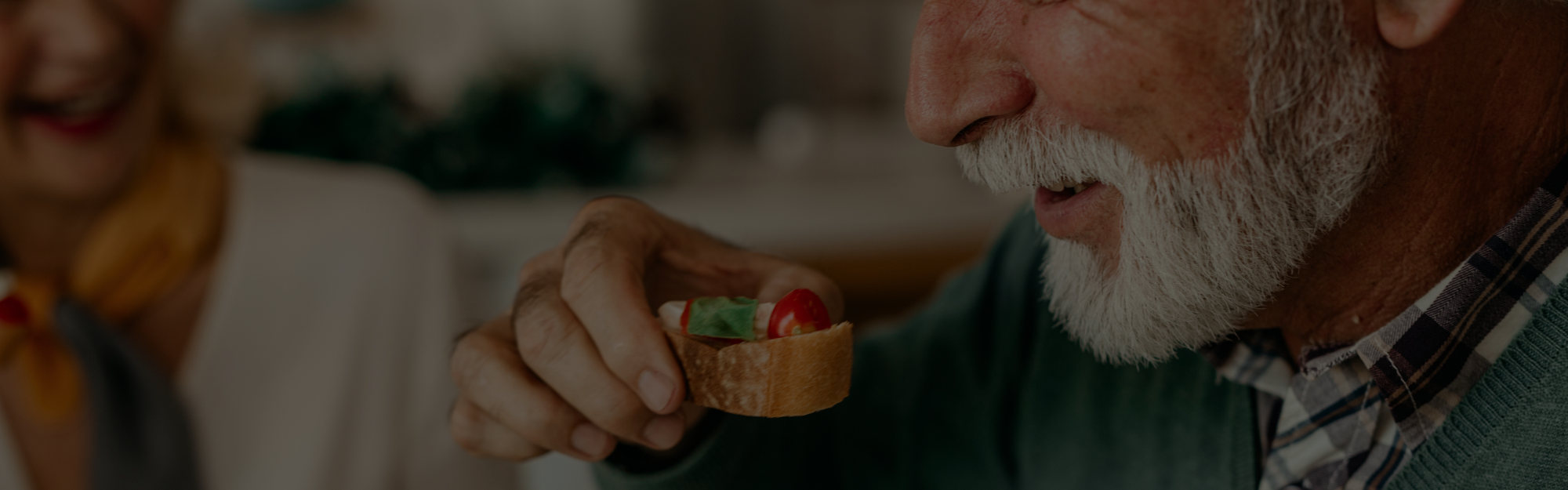 senior citizen eating food